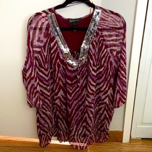 100% nylon short sleeve blouse. Plus size